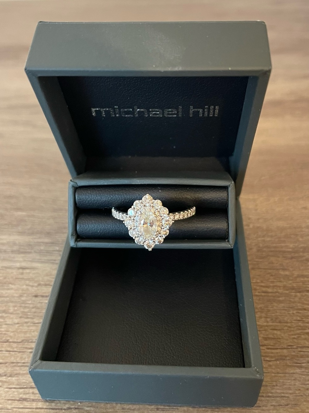 1.04 Carat Oval Halo Diamond Engagement Ring in White Gold.